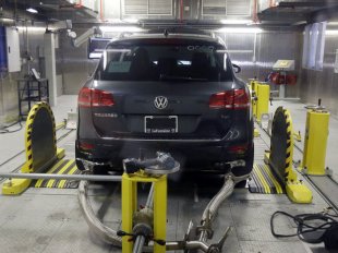 A Volkswagen Touareg diesel is tested in the Environmental Protection Agency's cold temperature test facility in Ann Arbor, Mich. The Hillsborough County Environmental Protection Commission voted Wednesday to sue the carmaker over an emission scandal.