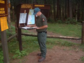 DEC forest ranger at trail head