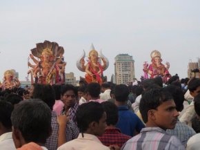 Giant Ganesha statues hit the beach in Mumbai, heading into the sea